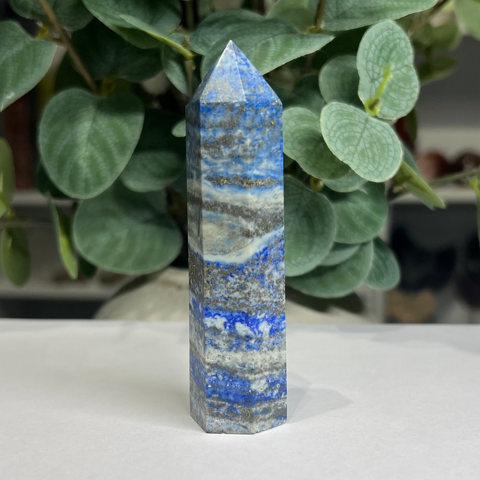 lapis lazuli tower e 9cm Lapis lazuli tower E 9cm, soft blue banded with grey and gold pyrite