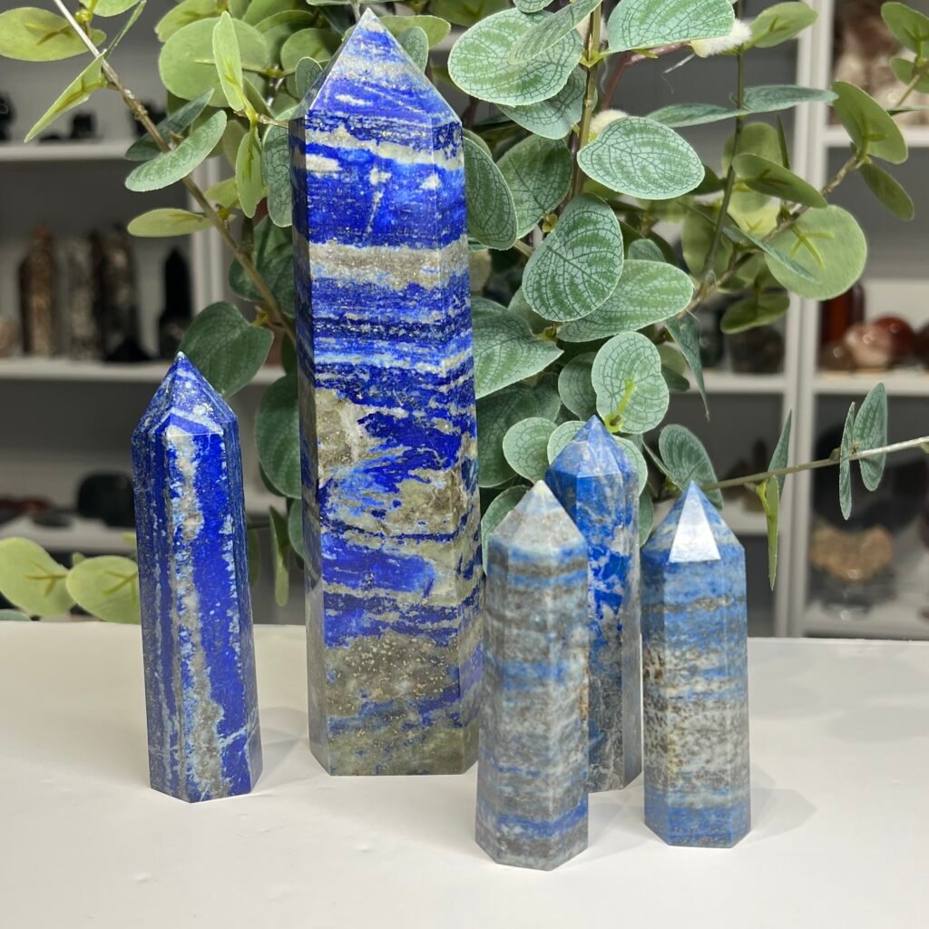 Home 2026 36 Lapis lazuli towers in five sizes from 7cm to 18cm, deep blue and pale denim blue with gold pyrite, Mystic Grove