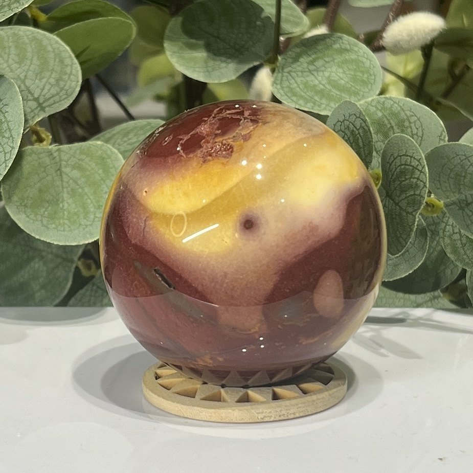 Mookaite Sphere Mookaite sphere D 67mm on a wooden stand, red, burgundy and mustard yellow jasper, Mystic Grove UK