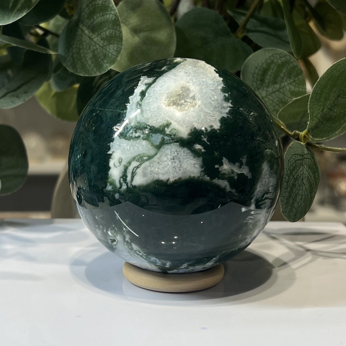 Moss agate sphere B, 80mm, deep forest green with a white cloud