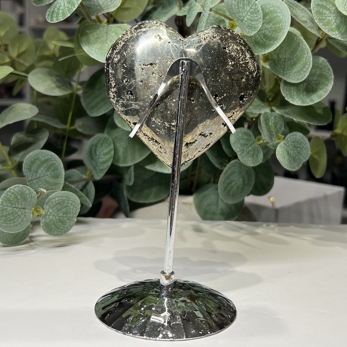 Pyrite heart on stand, polished back Pyrite heart on stand, polished back