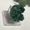 Raw Malachite on Stand 4.5cm to 7cm Raw malachite specimen side view on its acrylic stand