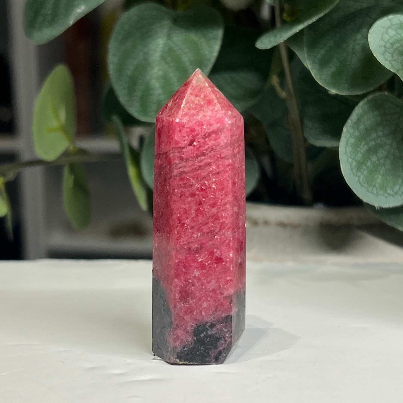 rhodonite tower a 6cm Rhodonite tower A 6cm, deep rose pink with a black manganese base