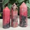rhodonite towers small group Three small rhodonite towers 6cm to 8cm, rose pink rhodonite with black manganese, Mystic Grove