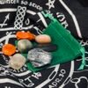 Samhain crystal set of seven tumblestones Samhain crystal set of seven tumblestones, obsidian, black tourmaline, smoky quartz, labradorite, moonstone, carnelian and red jasper, with a green velvet pouch