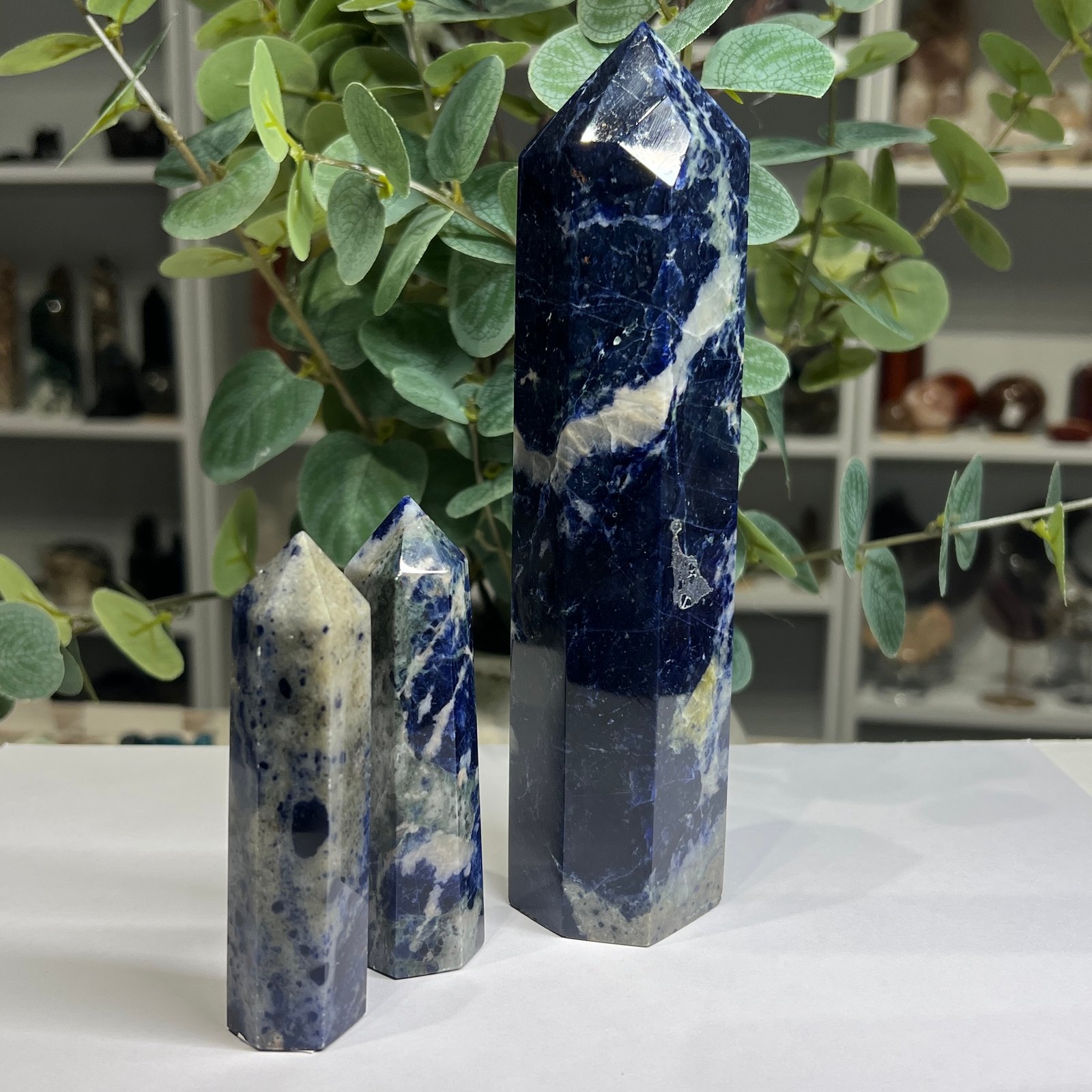 sodalite towers group Three sodalite towers, a large 19cm tower and two 9cm towers, royal blue with white veining, Mystic Grove