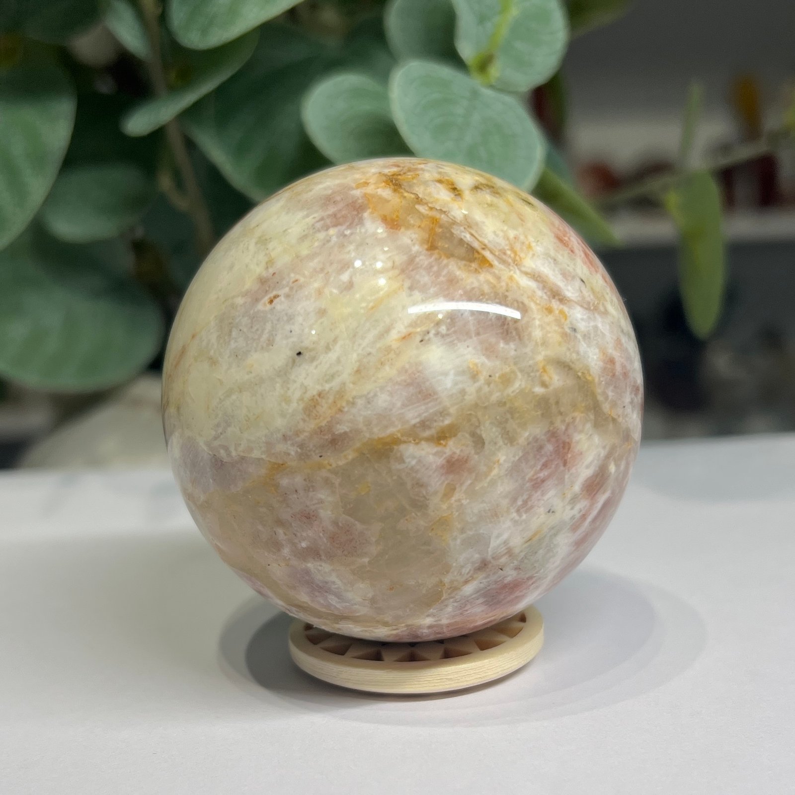 sunstone sphere 6cm 3 Sunstone sphere 6cm, soft peach and cream with golden lines