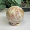 sunstone sphere 6cm 4 Sunstone sphere 6cm, salmon sunstone glowing through milky feldspar