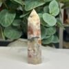 sunstone tower b 9cm Sunstone tower B 9cm, bright orange sunstone with a band of black tourmaline