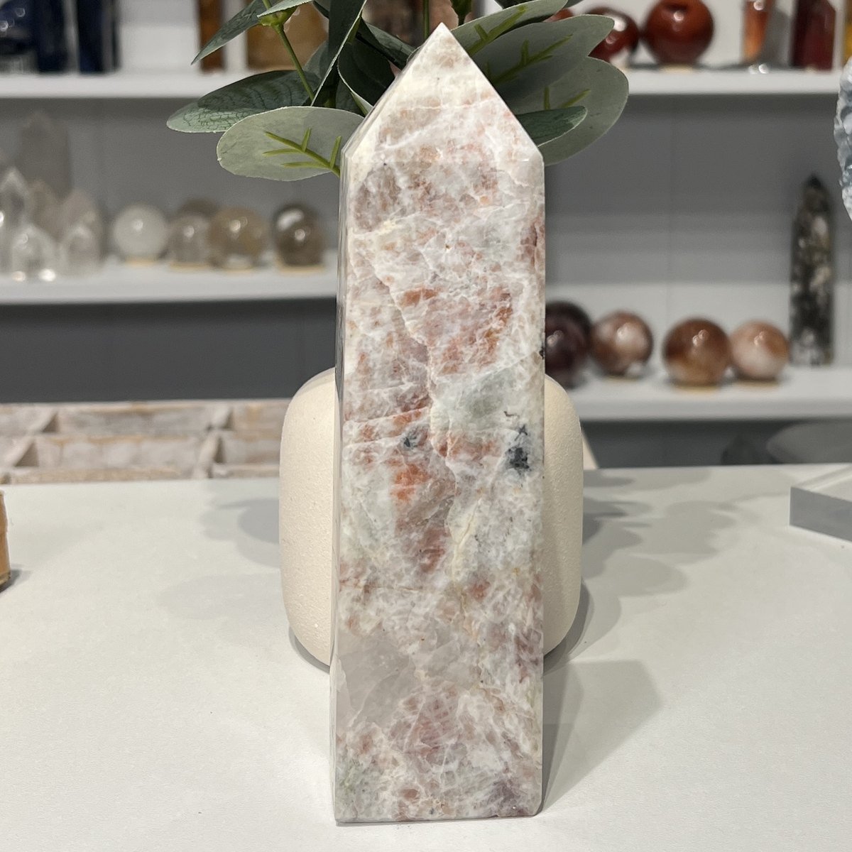 Sunstone Tower C 20cm Sunstone tower C, 20cm, white feldspar with salmon sunstone and soft green patches