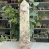 sunstone tower large 26cm Large sunstone tower 26cm, peach sunstone in cream feldspar with black tourmaline near the tip