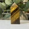 Tigers eye tower A Tigers eye tower A, polished point