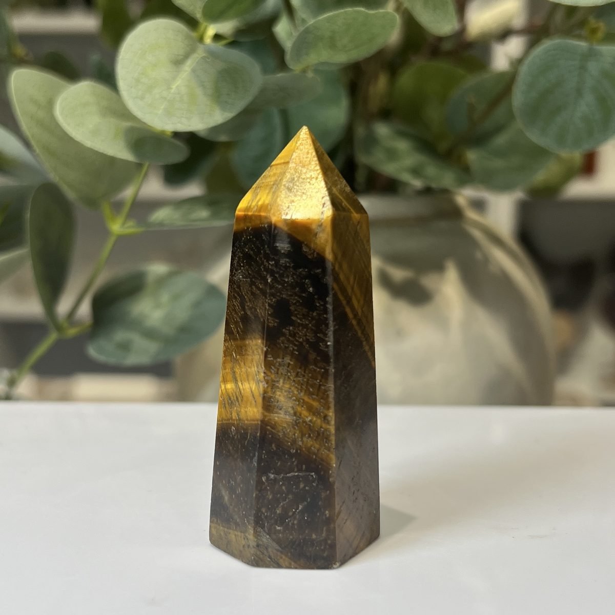 Tigers eye tower C Tigers eye tower C, polished point