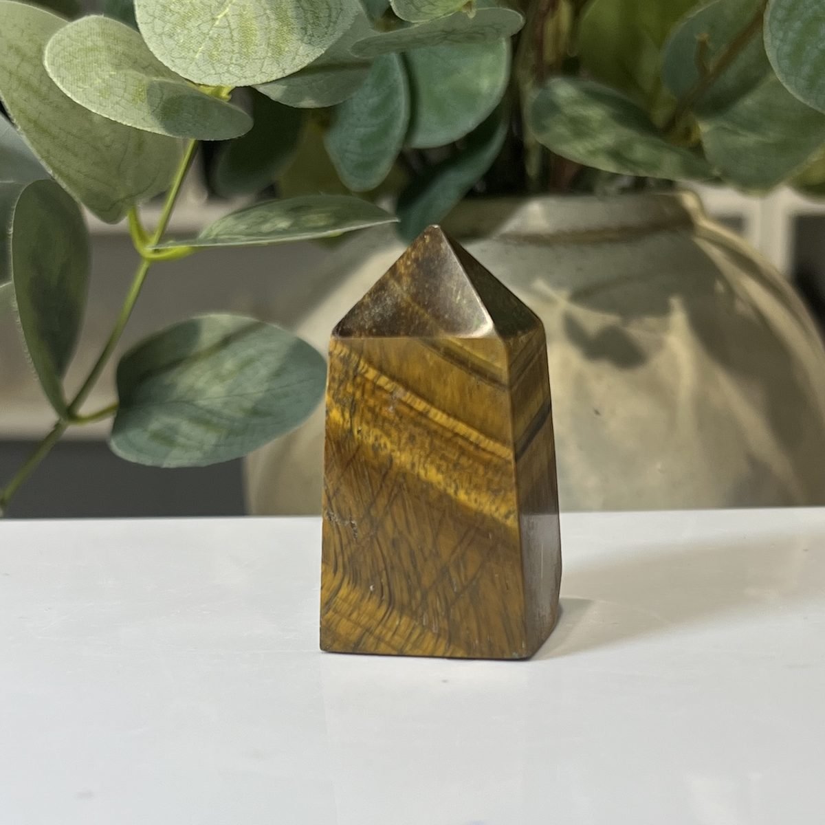 Tigers eye tower E Tigers eye tower E, polished point