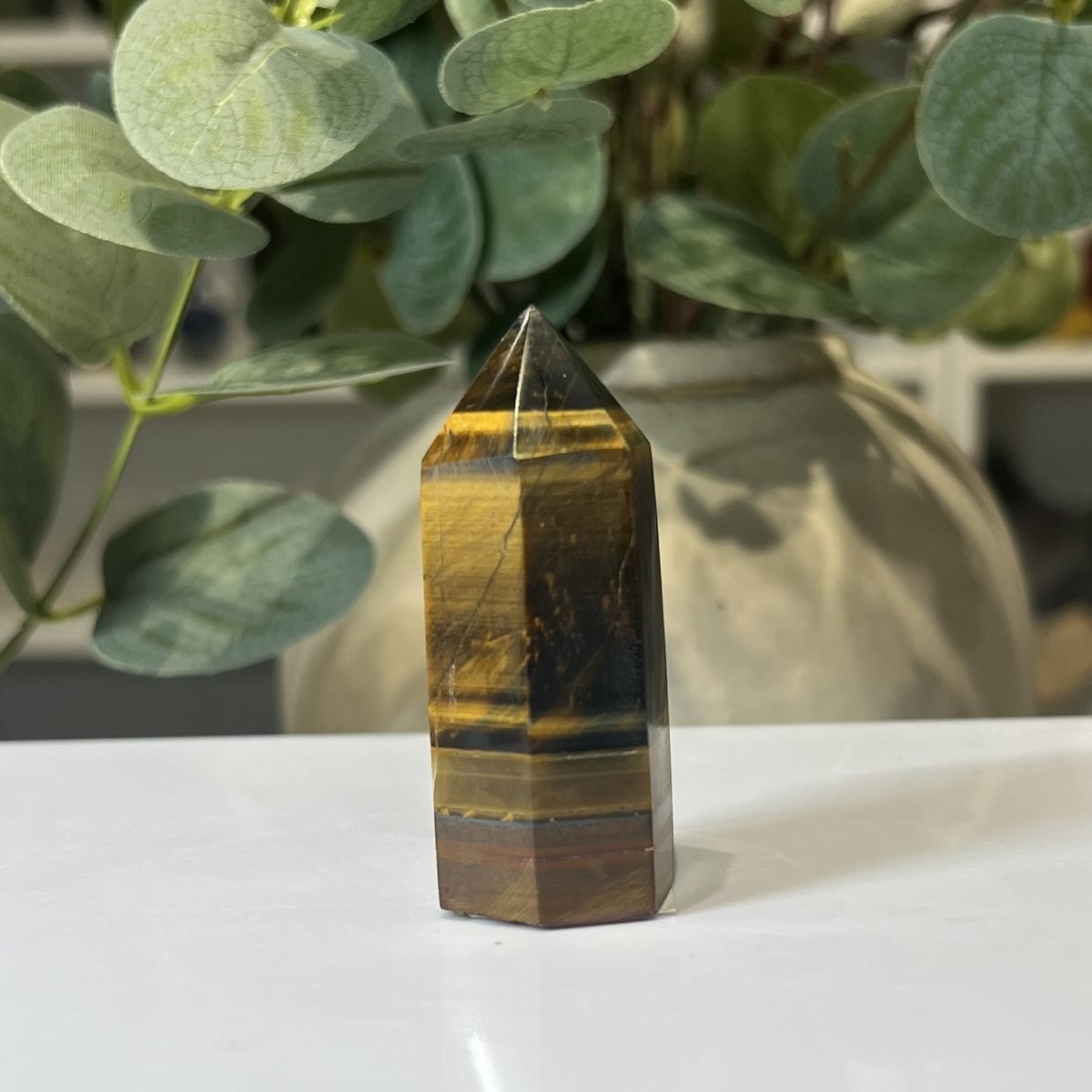 Tigers eye tower F Tigers eye tower F, polished point