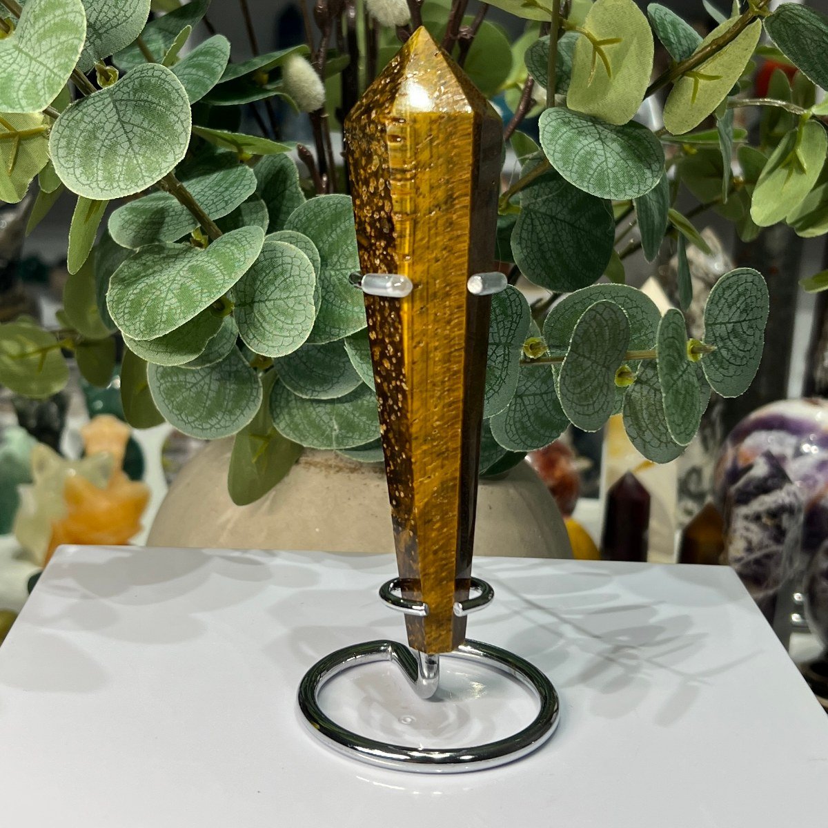 Tigers eye wand 13cm on a metal stand