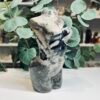 Volcano Agate Goddess Body Three Quarter Volcano agate goddess body three quarter view showing blue black chalcedony across the chest and waist